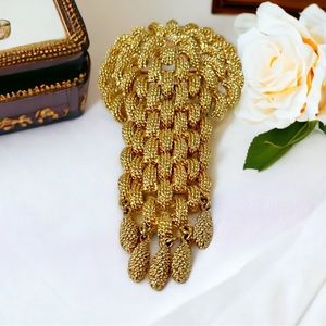 Monet, "etude" 60s vintage gold plated articulated brooch